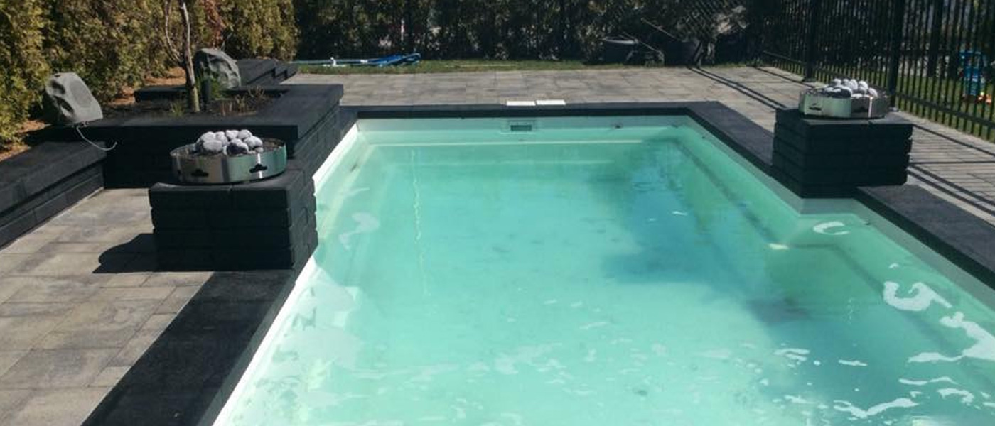 Water based acrylic sealer for pools