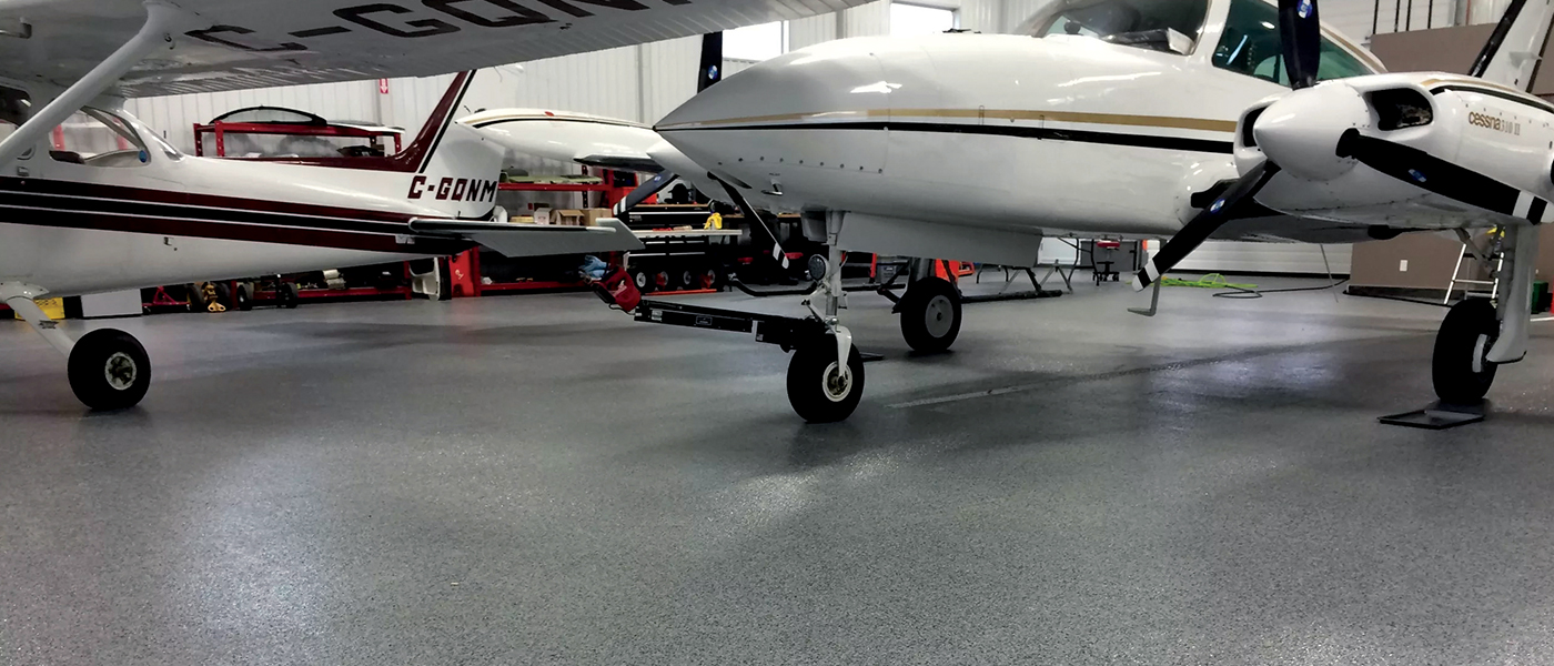 Hangar epoxy coating - planes into hangar
